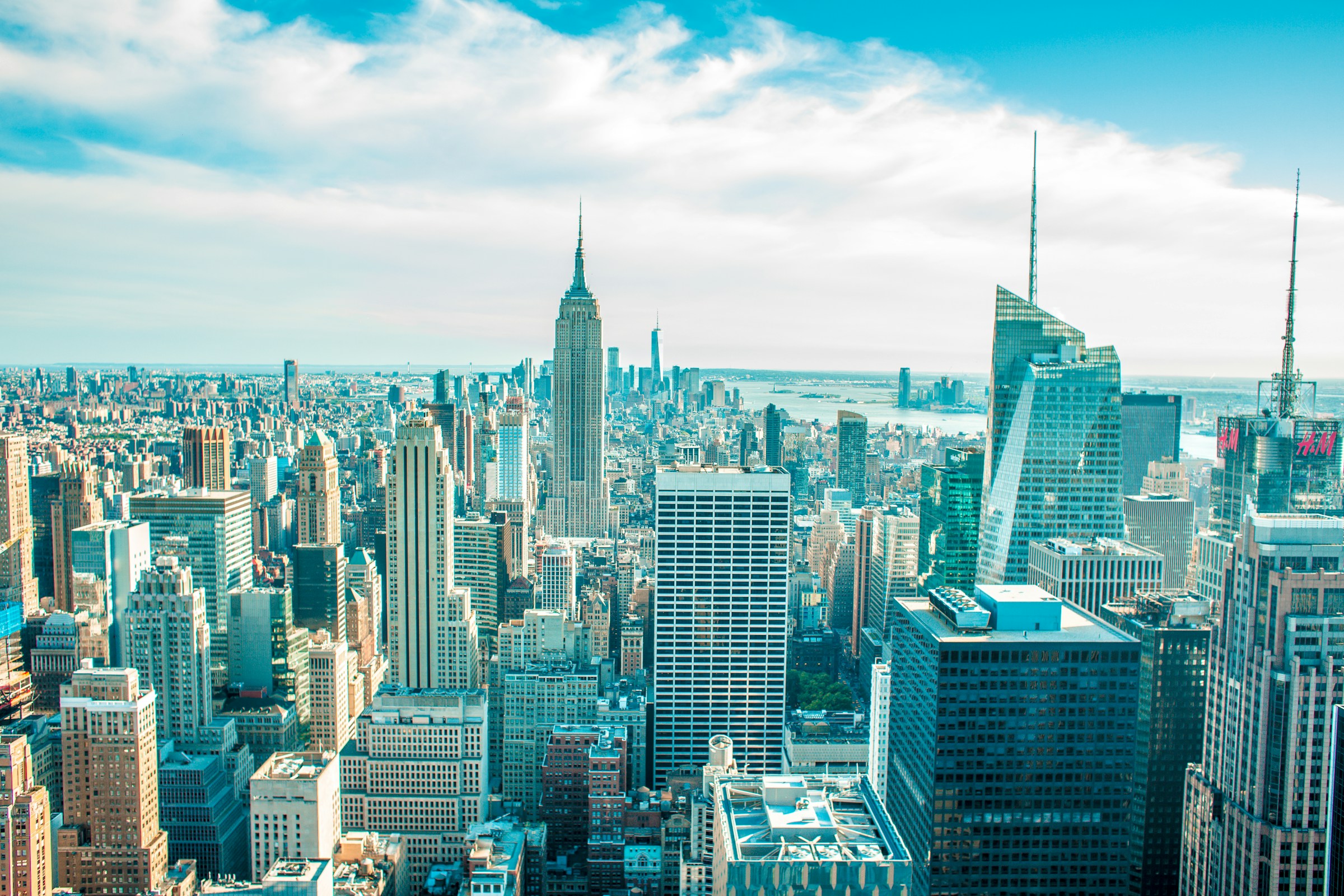 New York City skyscrapers with the Empire State Building against a blue sky